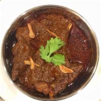Saoji Goat Curry · Curry seasoned dish. 