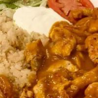 Pollo Mango Habanero · Chicken topped with mango habanero house sauce. Served with lettuce, guacamole, sour cream t...