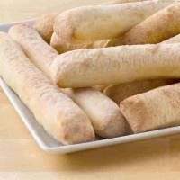 Breadsticks · Fresh, oven-baked dough. Served with 1 dipping sauce. 