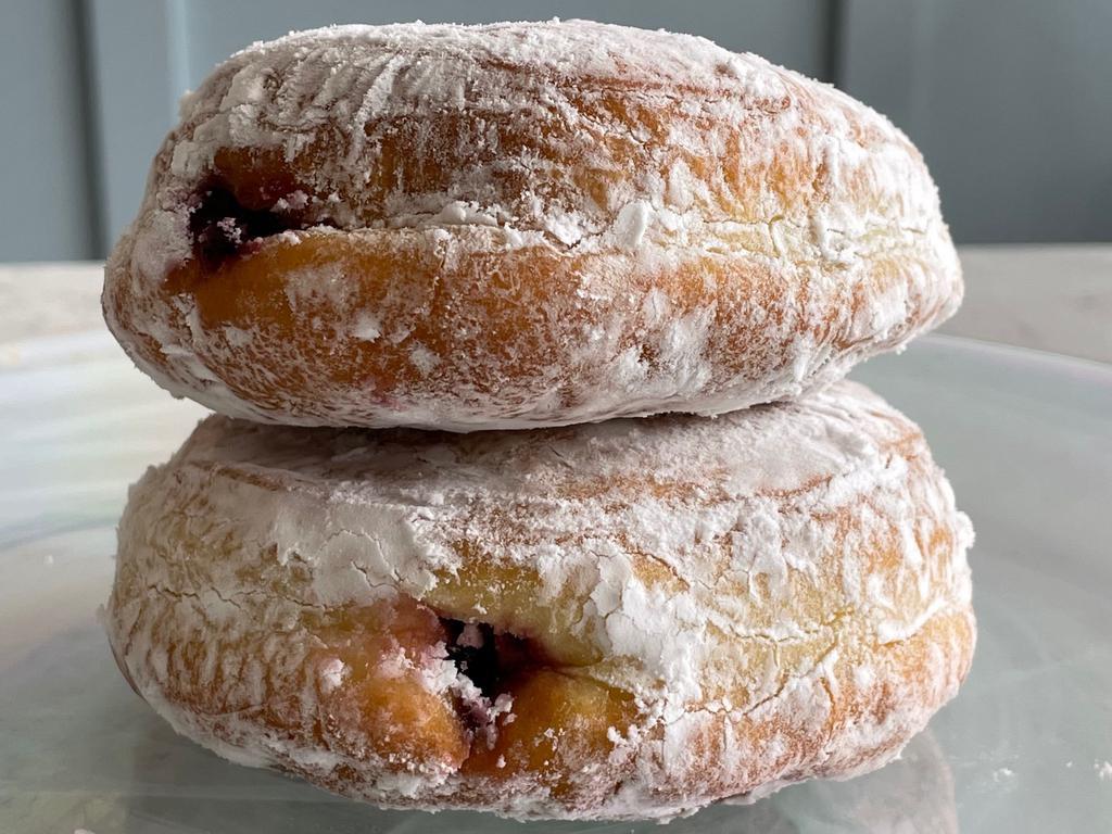 Don't Be Jelly · Yeast donut filled with black raspberry jelly and coated in powdered sugar