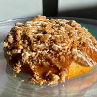 Crumbelievable Apple Caramel · Yeast bismark donut filled with apple filling, dipped in caramel, covered with homemade crum...