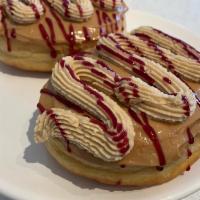 Peanut Butter Jelly Time · Yeast donut filled with black raspberry jelly, topped with peanut butter, peanut butter butt...