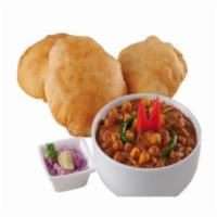 Chole Bhature · Spices. Chickpeas prepared a curry made with traditional Indian spices and 2 deep fried bread.