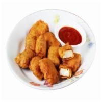 Paneer Pakoras · Gluten free paneer cheese deep fried in chickpea batter and fried, served with mint chutney ...