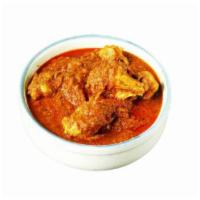 Chicken Bhuna · Curry with mint chutney and Indian sauce.