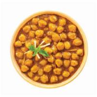 Chicken Chana · Chicken and chickpea with traditional curry sauce.
