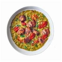 Chicken Daal · Lentils and chicken with Indian curry.