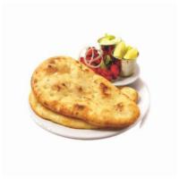 Aloo Kulcha · Naan bread stuffed with potatoes and spices baked in tandoor.