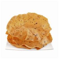 Pappadums  · 2 pieces. Crispy lentil flour bread.
