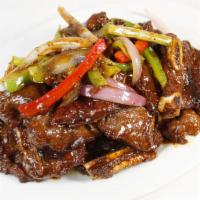 Beef Short Ribs with Black Pepper Sauce 黑椒牛仔骨飯 · 
