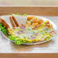 1. Western Omelette · An omelette served with scrambled eggs, ham, bell peppers and onions.