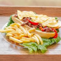18. Philly Cheese Steak Sandwich · Steak, cheese, and caramelized onion sandwich.