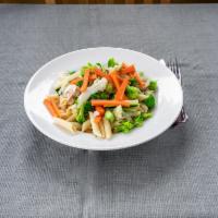 Pasta with Primavera Sauce · Fresh spring vegetables, mushrooms, zucchini, zucchini, broccoli, and carrots in a red or pi...
