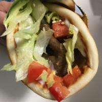 Gyro Sandwich · A style of Greek Sandwich (shawarma)
Slow roasted lamb & beef with Mediterranean spices topp...