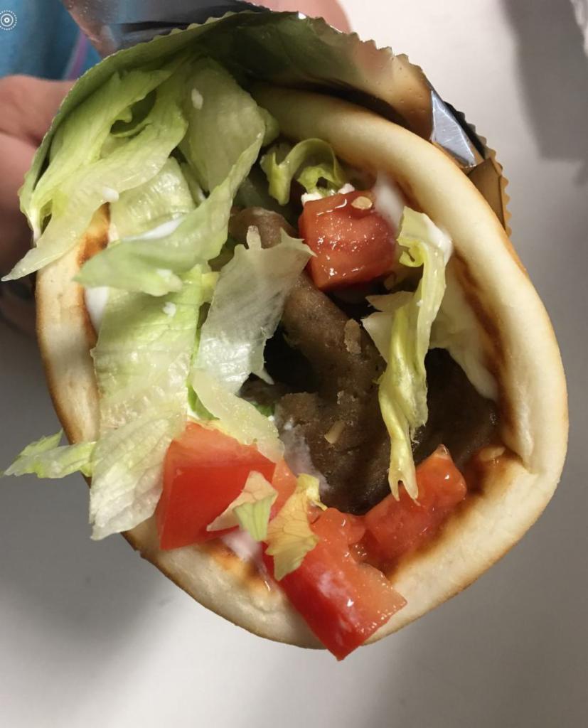 Gyro Sandwich · A style of Greek Sandwich (shawarma)
Slow roasted lamb & beef with Mediterranean spices topped with tzatziki sauce and wrapped in a soft warm pita. Add your choice of tomatoes, lettuce, onions and fetta cheese.