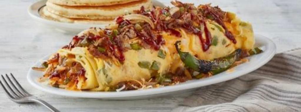 NEW JERSEY MEAT OMELETTE · stuffed with bacon,sausage,ham,beef,green and red peppers,onions,coverd with jack and cheddar cheese and house special salsa..
serve with home fries or french fries and toast
