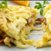 FLORIDA BACON CHEESE OMELETTE · serve with home fries or french fries and toast