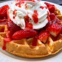 WAFFLE WITH FRESH STRAWBERRY · fresh strawberry, powder sugar,maple syrup and whip cream(add toppings)