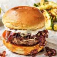MINA JACK BURGER · Our savory signature burger! A freshly seasoned patty topped with a Smokey BBQ sauce, sautée...