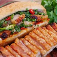 Pork Belly Sandwich · Tasty fried pork, a bed of lettuce, chopped cilantro, fresh pico de gallo, sliced tomato and...