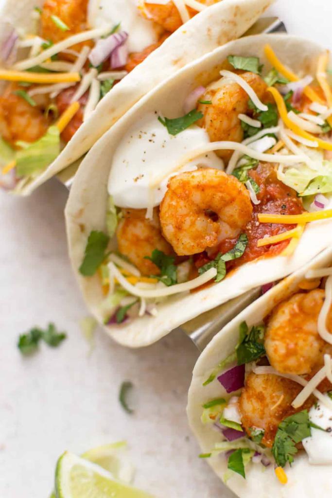 2. Chido Shrimp Taco · Sauteed shrimp, cilantro pico de gallo, guacamole and cheese. Includes 2 tacos.