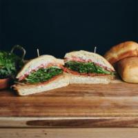 The Whoop Whoop Sandwich · Vegan deli slices, vegan pepperoni, mixed greens, tomato, red onion, vegan basil aioli and o...