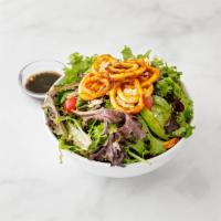 Grilled Calamari Salad · Fresh spring mix, goat cheese, tomatoes and freshly grilled calamari rings.