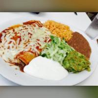 2 Cheese Enchiladas Combo · rice, beans, guacamole, and sour cream on the side