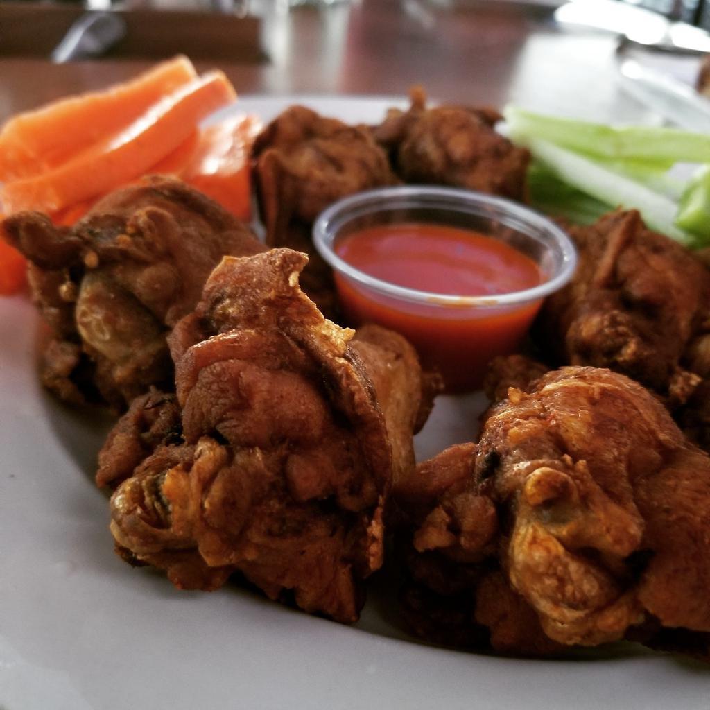 Famous 92nd St Wings · Six jumbo chicken wings fried with your choice of sauce or dry rub served with carrots, celery & your choice of dipping sauce. Sauce/Rub Options: Sal’s Famous Double Dipped (most popular), Habanero, Buffalo, Dry Sriracha Rub, Lemon Pepper, Garlic Parmesan, BBQ, or Teriyaki