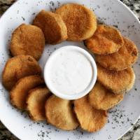 Crispy Zucchini · Hand breaded zucchini battered & fried. Served with Ranch dressing.