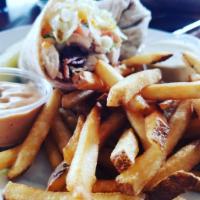 Southwest Chicken Wrap · Grilled chicken, bacon, lettuce, tomato, & sliced cheddar served in a warm wheat tortilla wi...