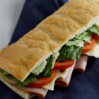 Ham & Swiss · baked savory ham topped with sweet swiss cheese, vine ripened tomatoes, crunchy romaine and ...