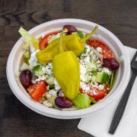 Greek Salad  · Lettuce, tomatoes, cucumbers, onions, Kalamata olives, feta cheese, and pepperoncini.