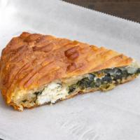 Spanakopita · Spinach pie. Made with fresh spinach, dill and feta cheese.