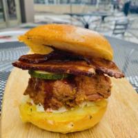 Moonshine BBQ Chicken Sandwich  · Crispy buttermilk chicken, moonshine BBQ sauce, bacon, homemade pickles, coleslaw, on a brio...