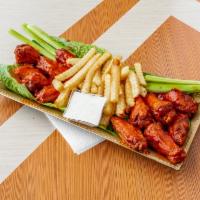 Wings · Served with celery and ranch sauce. Choice of Buffalo or BBQ.