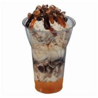 Made with Snickers Layered Sundae · Three scoops of made with snickers ice cream, crushed snickers pieces and caramel layers, to...