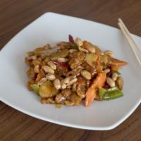 71. Kung Pao Chicken · Chicken diced and sauteed in rich browns sauce with red peppers, peanuts and bamboo shoots w...
