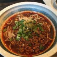 4. Chongqing Spicy Noodle Soup · Pickled mustard, scallion, chopped peanuts, shanghai bok choy and minced pork. Spicy. 
