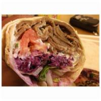Gyro Wrap · In a pita with tzatziki sauce lettuce, tomato and onion. With a side of the day.