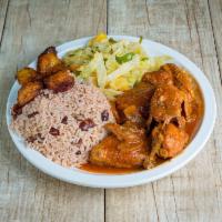 Brown Stew Chicken · Slow cooked soup.