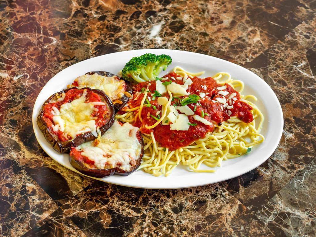 Eggplant Parmesan · Baked breaded Eggplant topped with marinara sauce, Parmesan and mozzarella cheese. Served with house salad and garlic bread or toast garnished with parsley, Parmesan cheese, Pepperoncini.