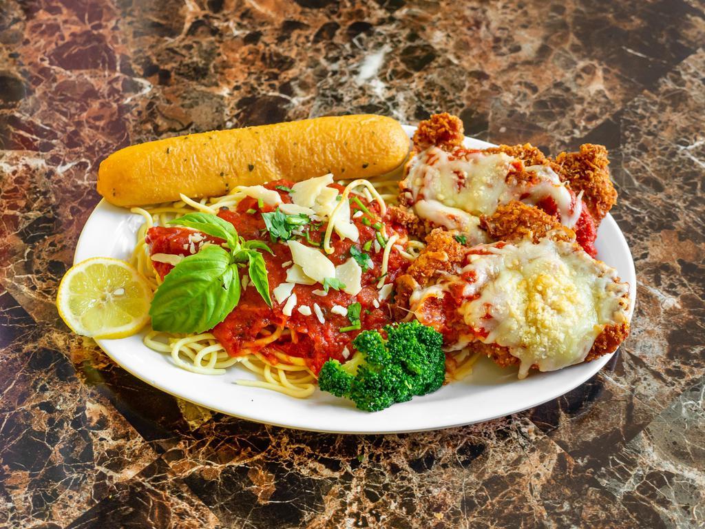 Vegetarian Lasagna · Vegetarian. Spinach, onion, bell peppers, mozzarella and Parmesan, and ricotta cheese and marinara sauce. Served with house salad and garlic bread or toast. Garnished with parsley, parmesan cheese, peppercini.
