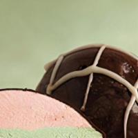 Strawberry Pumoni · Strawberry, pistachio, and chocolate gelato all coated with chocolate and drizzled with whit...