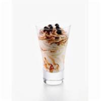 Coffee Gelato Coppa · Fior di latte gelato with a rich coffee and pure cocoa swirl.
