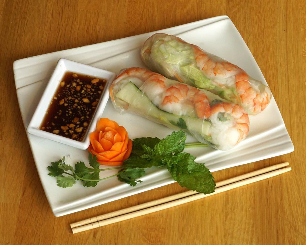 Sandy's Fresh Spring Roll · Refreshing cool rice paper rolls filled with rice noodles crisp fresh vegetables served with homemade peanut sauce. Gluten-free.