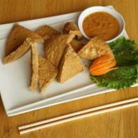 Crispy Tofu · Deep-fried crispy tofu served with Thai peanut sauce. Gluten-free.