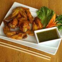 Thai Chicken Wing ·  All natural chicken wings marinated in homemade Thai marinade sauce,  fried to a golden bro...