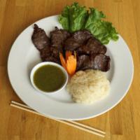 Thai Beef Jerky and Sticky Rice · All natural USDA 100% beef tenderloin marinated in homemade Thai marinade sauce.  Served wit...