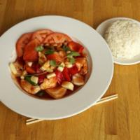 Pad Sweet and Sour · Onions, tomatoes, bell peppers, and pineapples stir-fried in a sweet and sour tangy sauce. G...